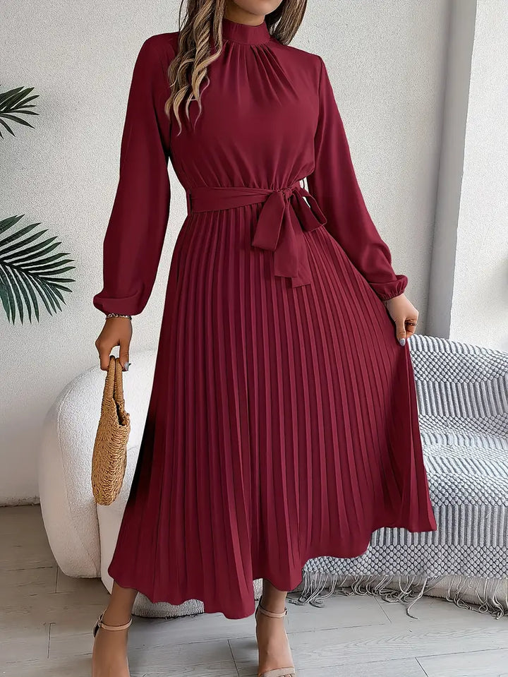 Belted Pleated Midi Dress with Long Sleeves – Elegant High Neckline