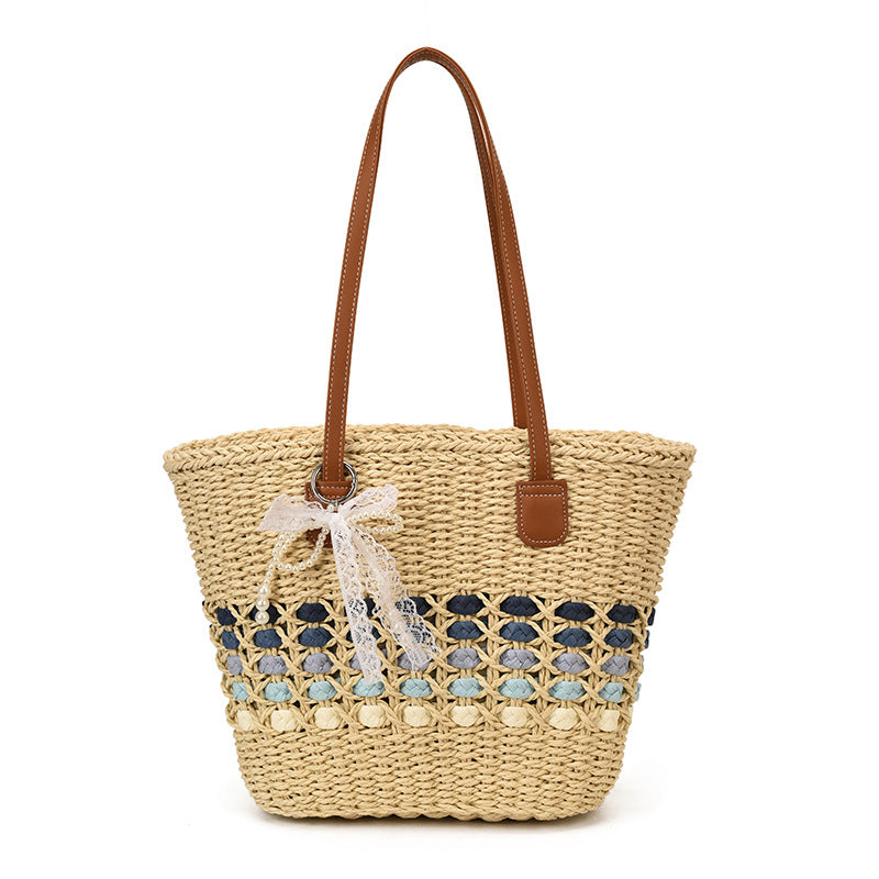 Woven Straw Beach Tote with Floral Accents and Leather-Like Handles