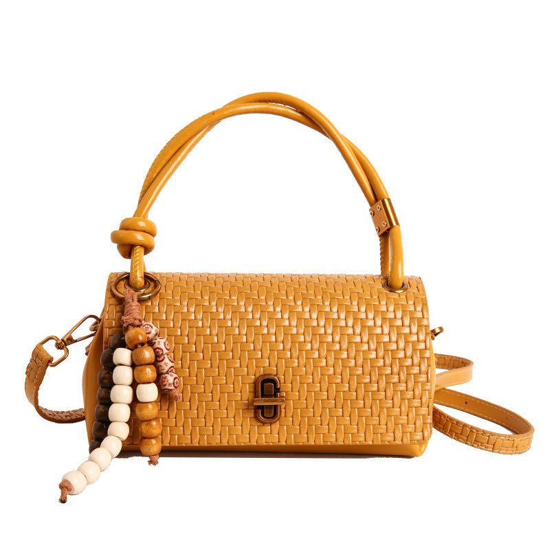 Artisan Woven Leather Shoulder Bag with Beaded Details