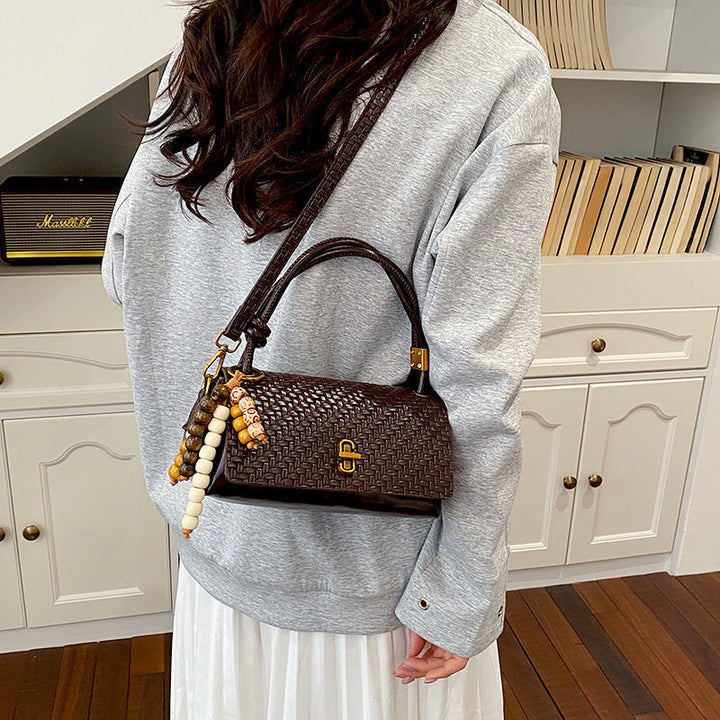 Artisan Woven Leather Shoulder Bag with Beaded Details
