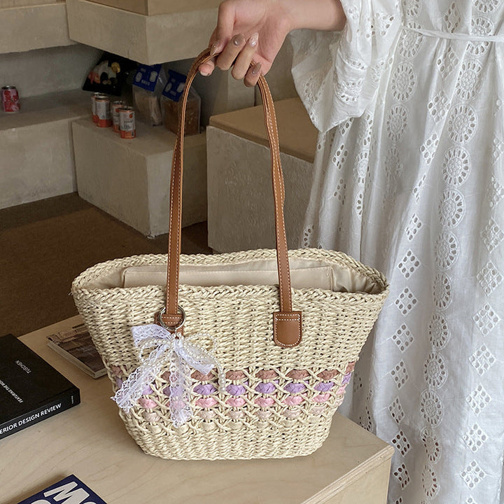 Woven Straw Beach Tote with Floral Accents and Leather-Like Handles