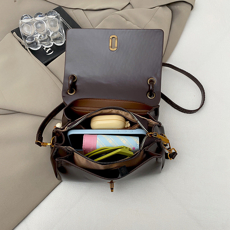 Artisan Woven Leather Shoulder Bag with Beaded Details