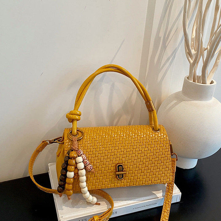 Artisan Woven Leather Shoulder Bag with Beaded Details