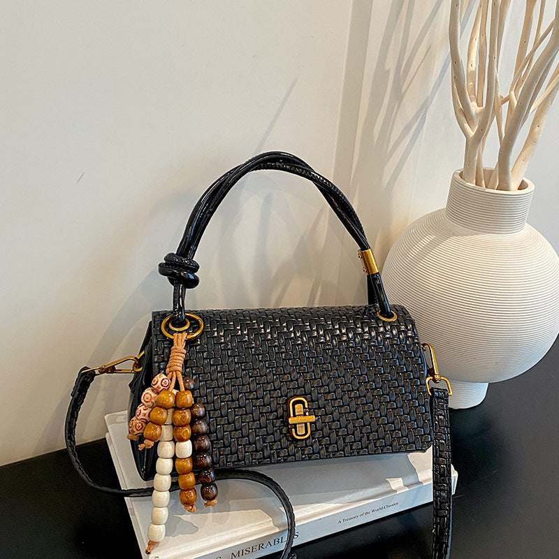 Artisan Woven Leather Shoulder Bag with Beaded Details