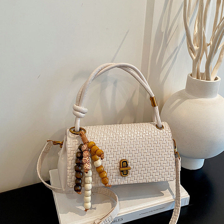 Artisan Woven Leather Shoulder Bag with Beaded Details