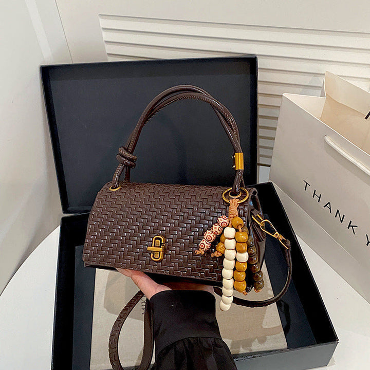 Artisan Woven Leather Shoulder Bag with Beaded Details
