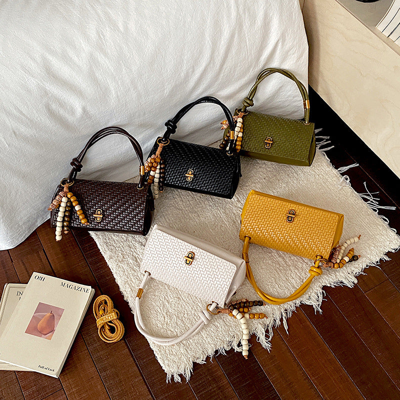 Artisan Woven Leather Shoulder Bag with Beaded Details