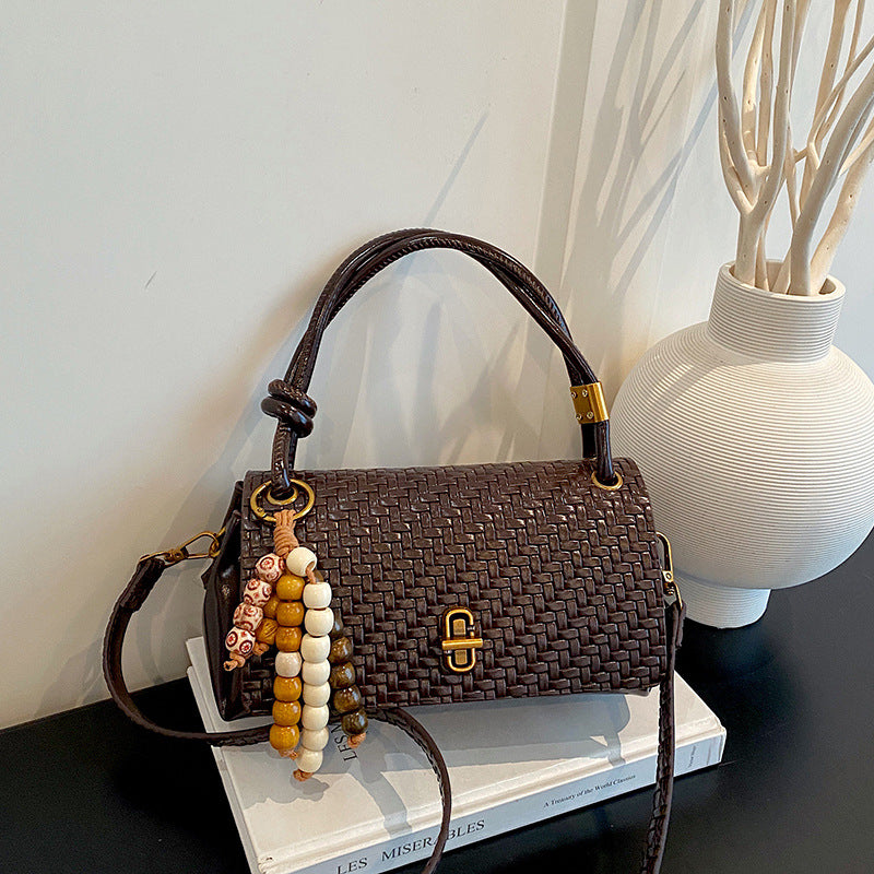 Artisan Woven Leather Shoulder Bag with Beaded Details