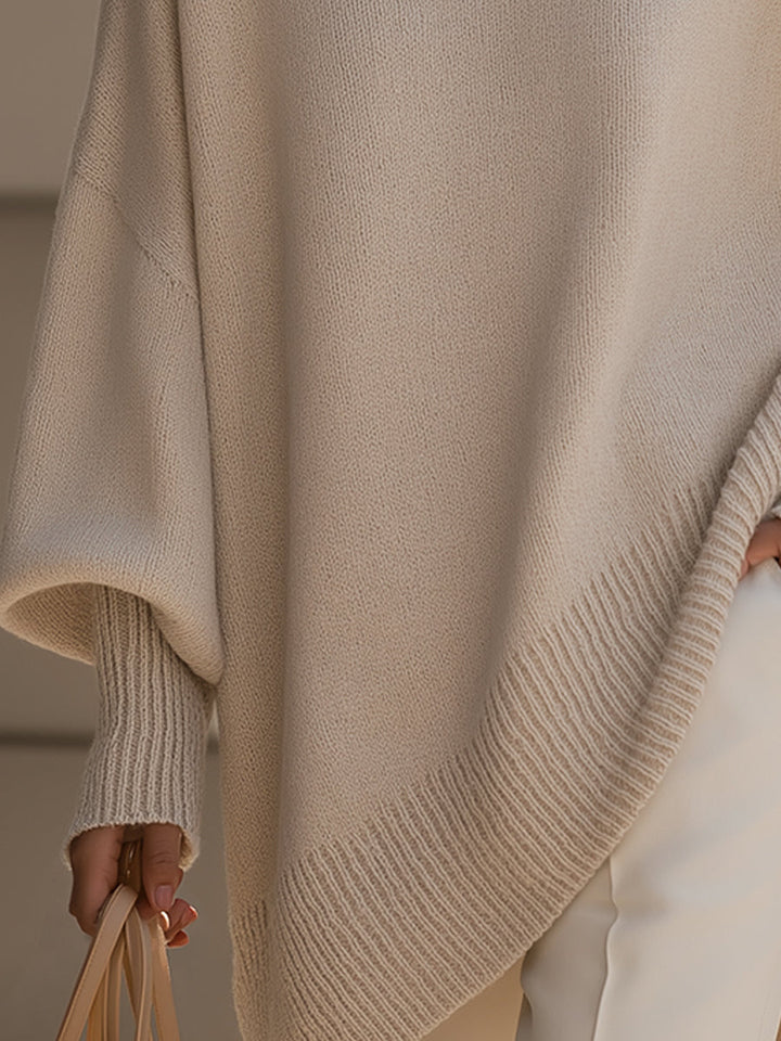 Halvara | Women's Oversized Batwing Knit Sweater — Mock Neck Pullover with Asymmetric Hem | Westmere
