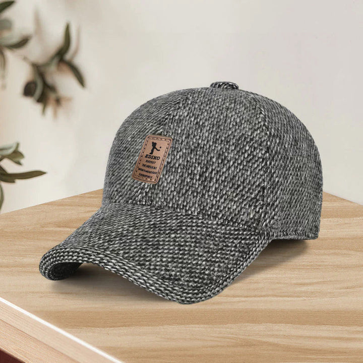 Warm winter cap for men with ear flaps